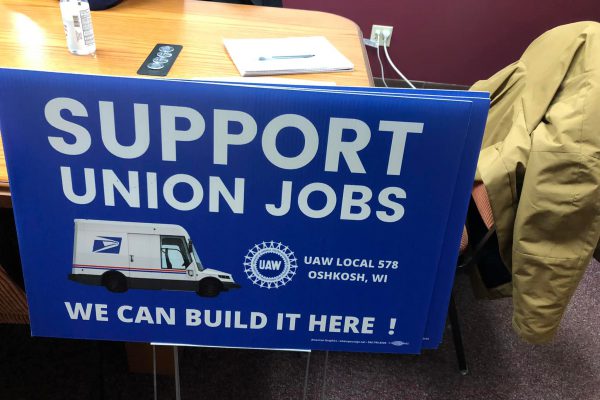 UAW sign which states, "Support Union Jobs. We can build it here!"